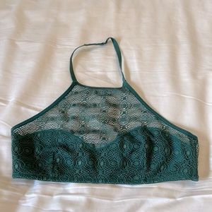 Teal lace halter bralette with back clasp closure. Lined without padding